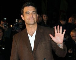 Usa/ Robbie Williams porta moglie in luna di miele un anno dopo